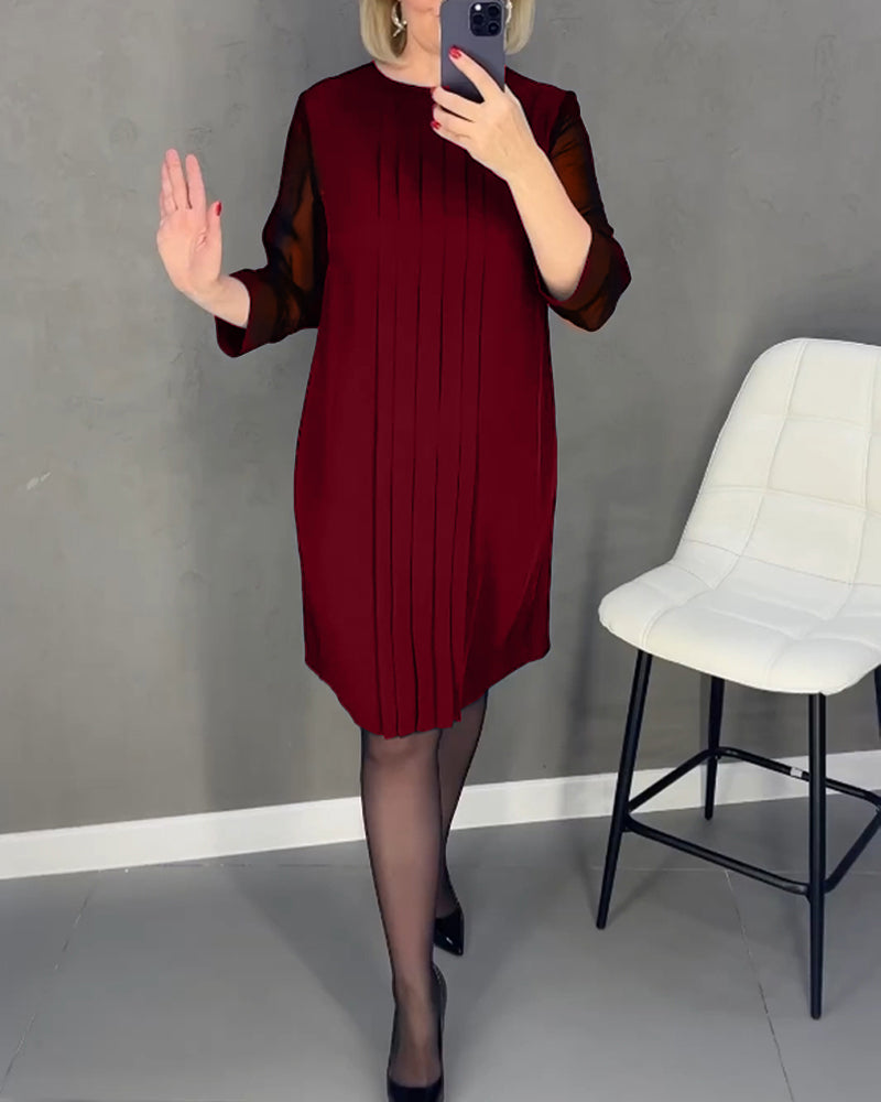 Elżbieta | Elegancka czarna sukienka z plisowanym przodem