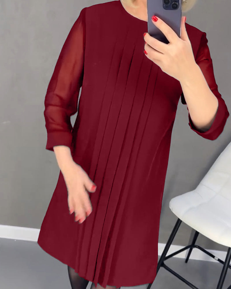 Elżbieta | Elegancka czarna sukienka z plisowanym przodem